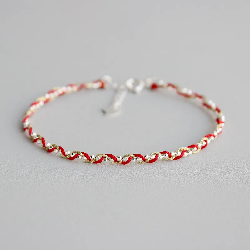 Silver Braided Bracelet With Gold Thread